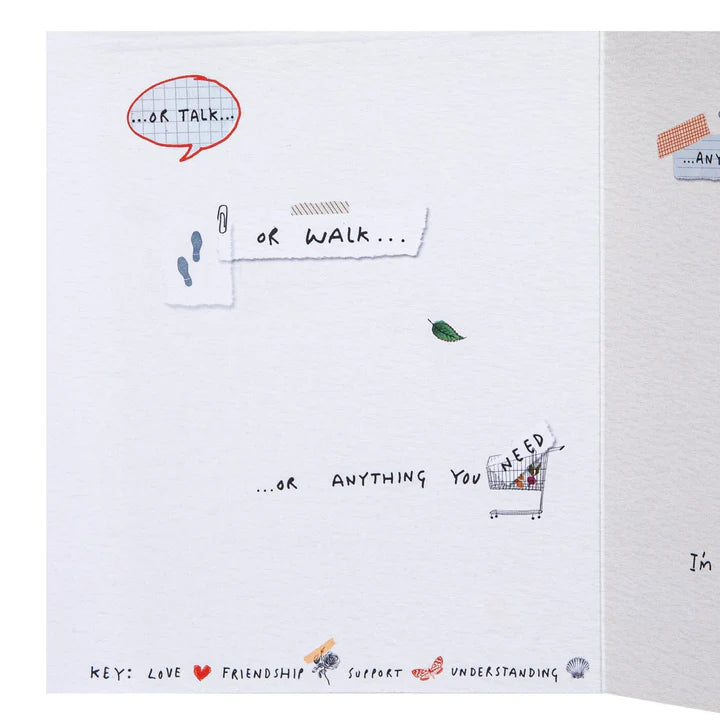 Open book with illustrations and text on a white background