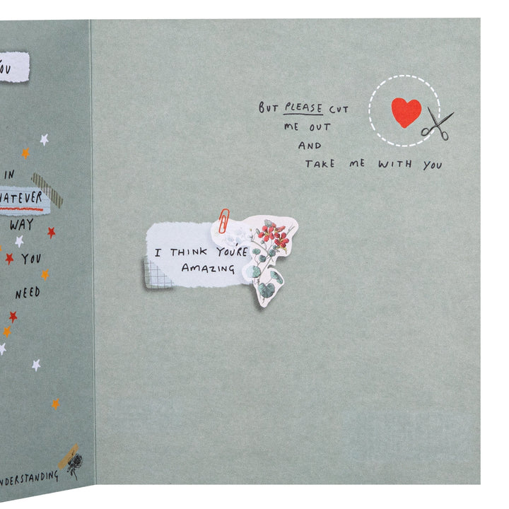 Card with cutout text and decorative elements on a gray background