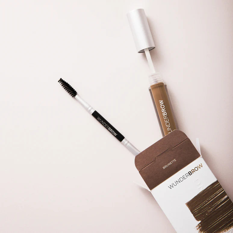 Wunderbrow eyebrow product set on a light pink background
