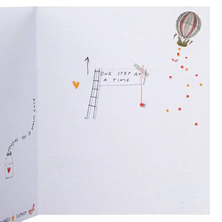 Illustrated page with a hot air balloon, ladder, and heart symbols on a white background.