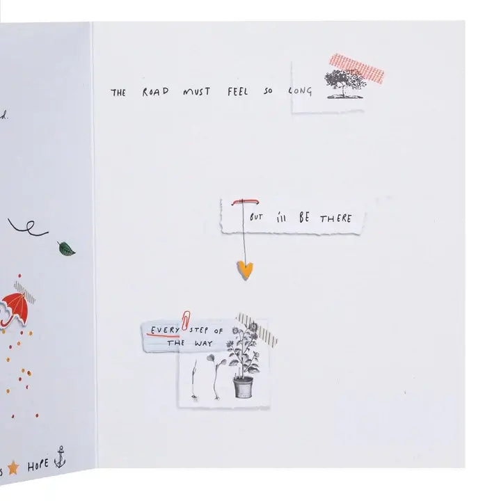 Open book with illustrations and text on a white background